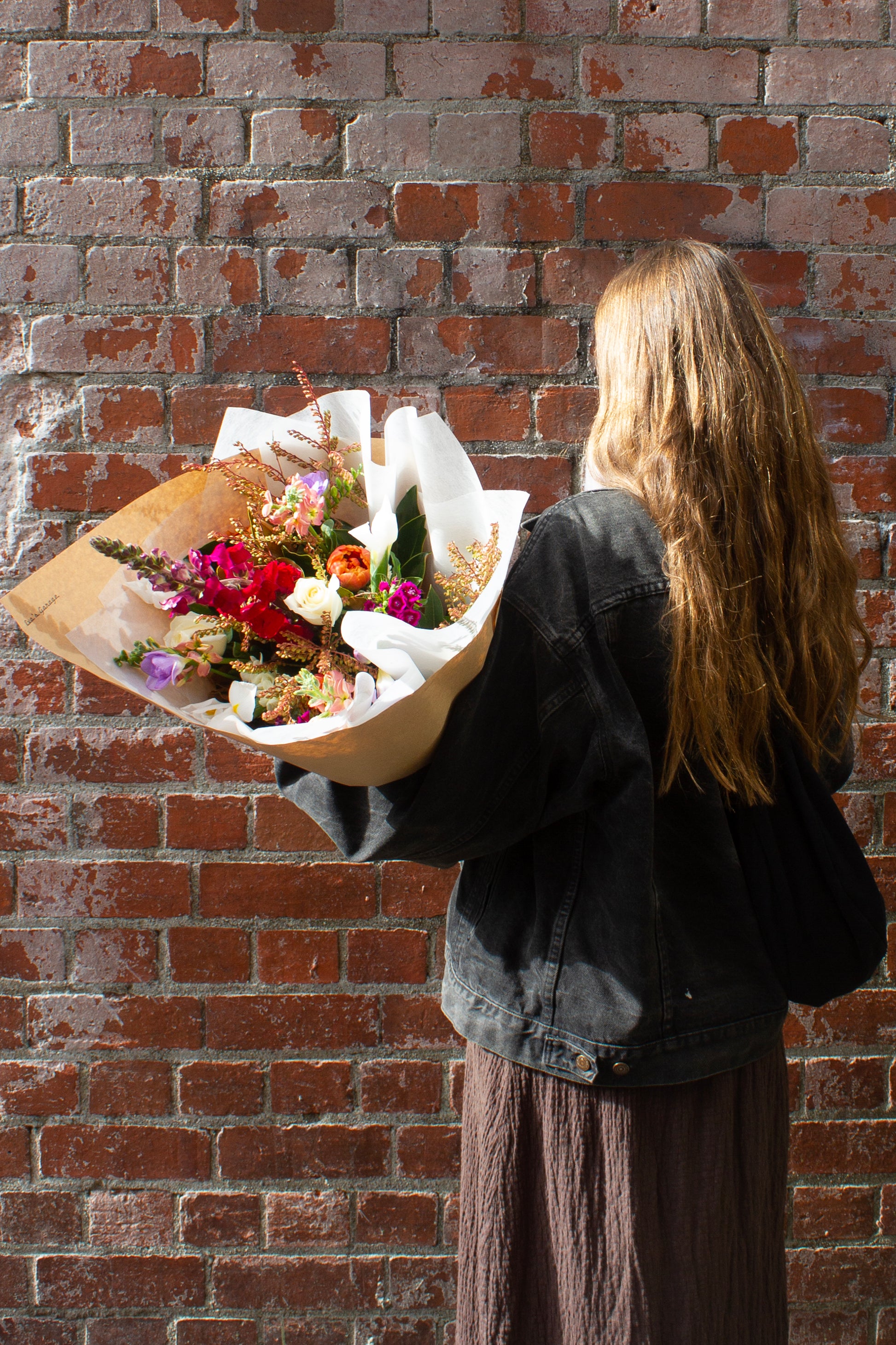 Large Florist’s Pick bouquet in bright mixed colours, wrapped in kraft paper – $100 size