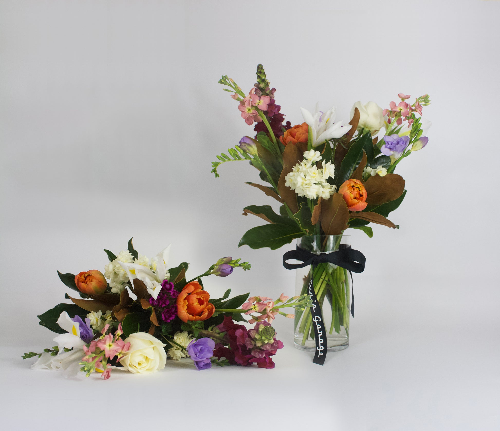 Medium Florist’s Pick bouquet in vase – $75 size, bright flowers