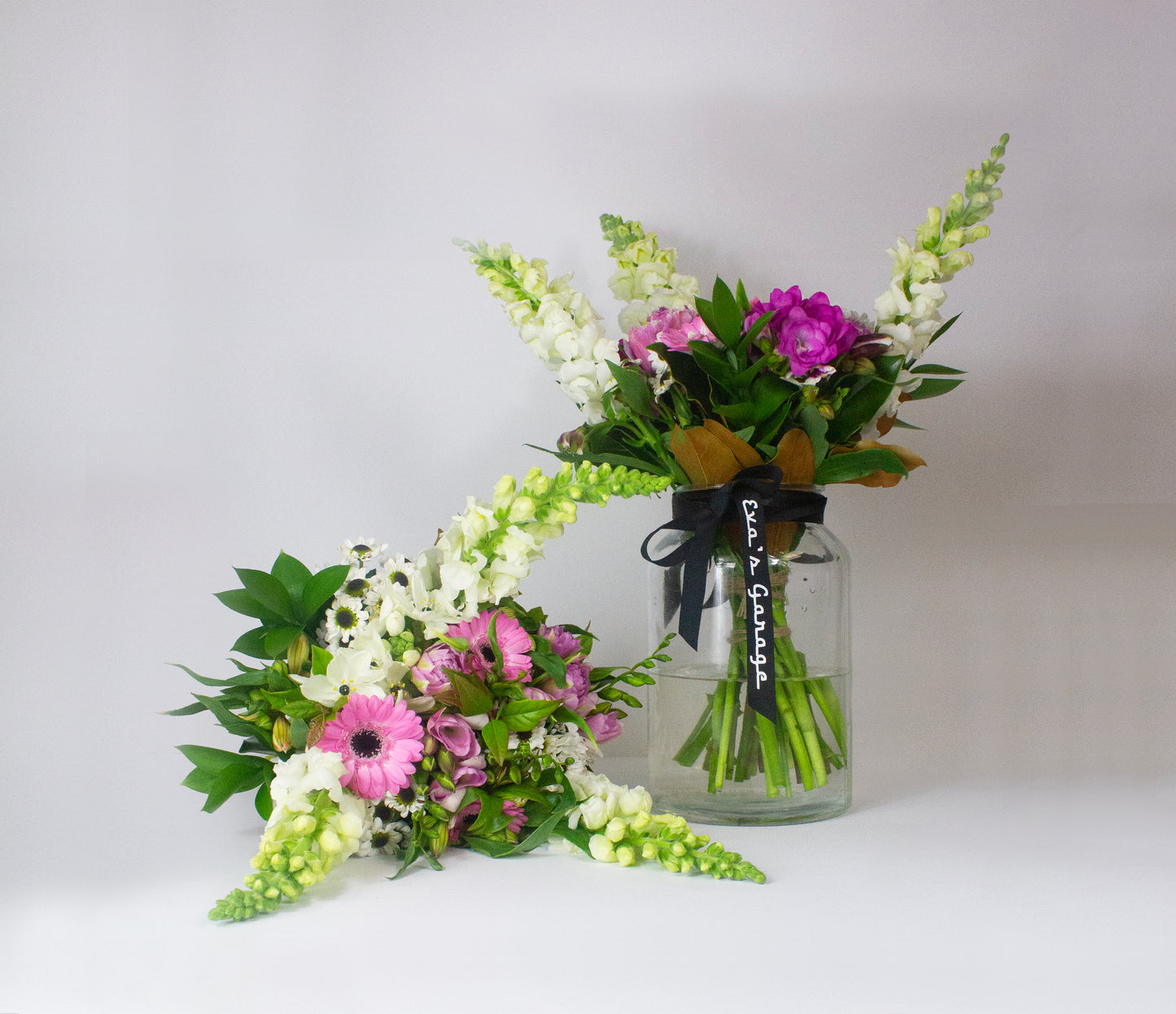 Large pastel bouquet with pinks, creams, and lavender tones.
