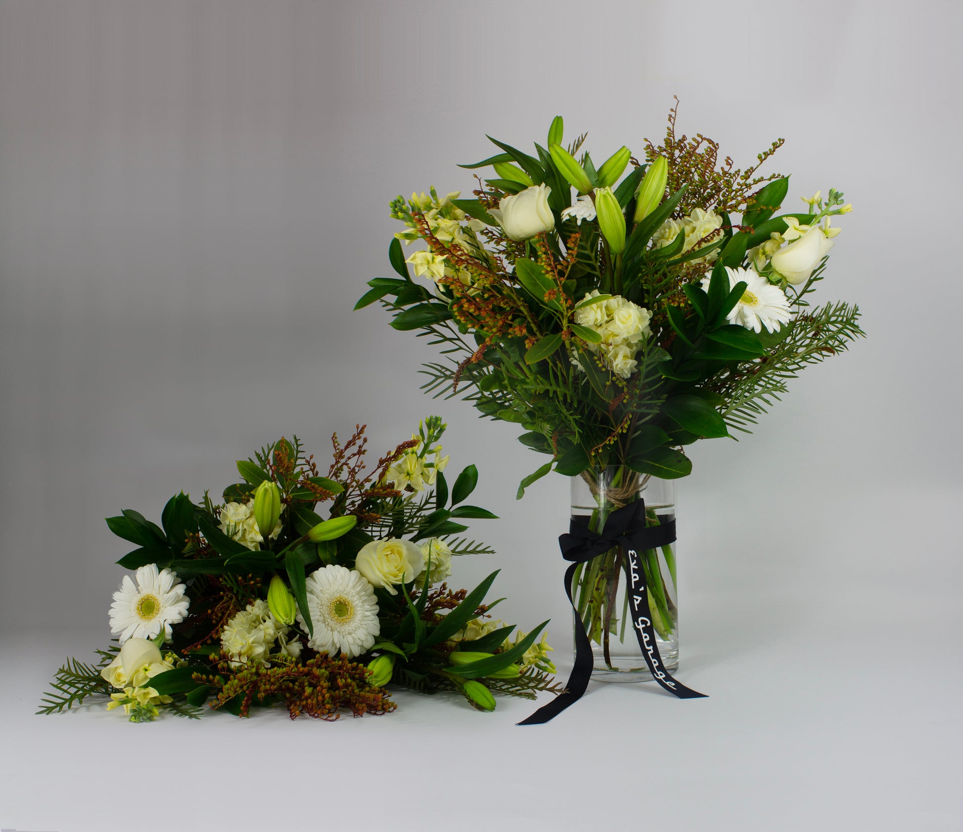 Medium neutral flower bouquet in vase – $75 size